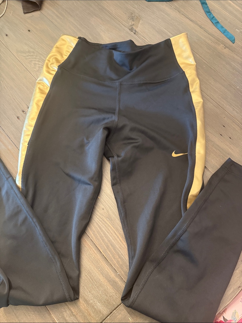 Nike women’s leggings- gold side Panels Medium